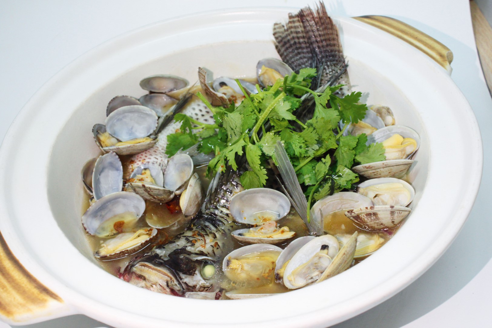 Restoran Yong Hoe famous for its Signature Claypot fish served with Rice Wine