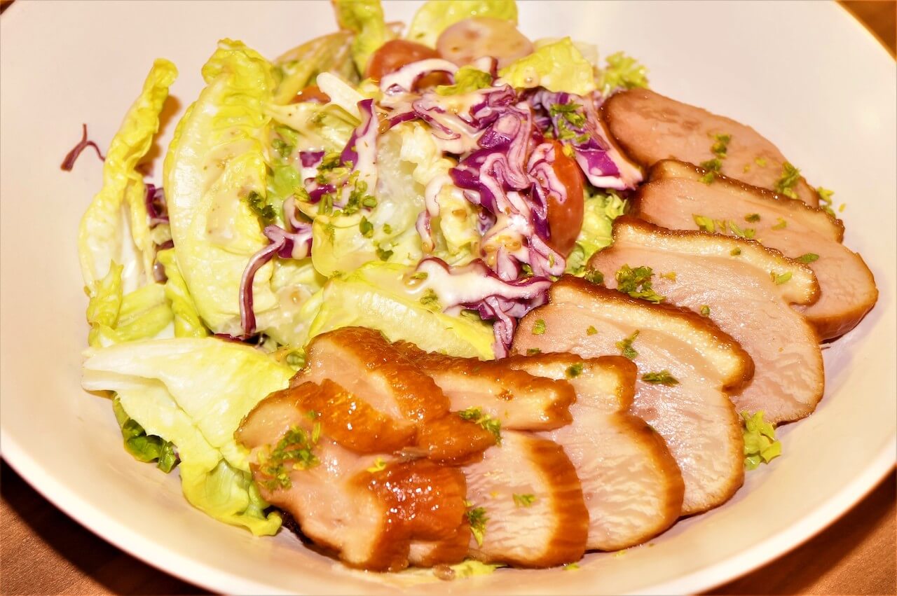 Smoked Duck Caesar Salad gets our thumbs-up at Eatlicious Restaurant